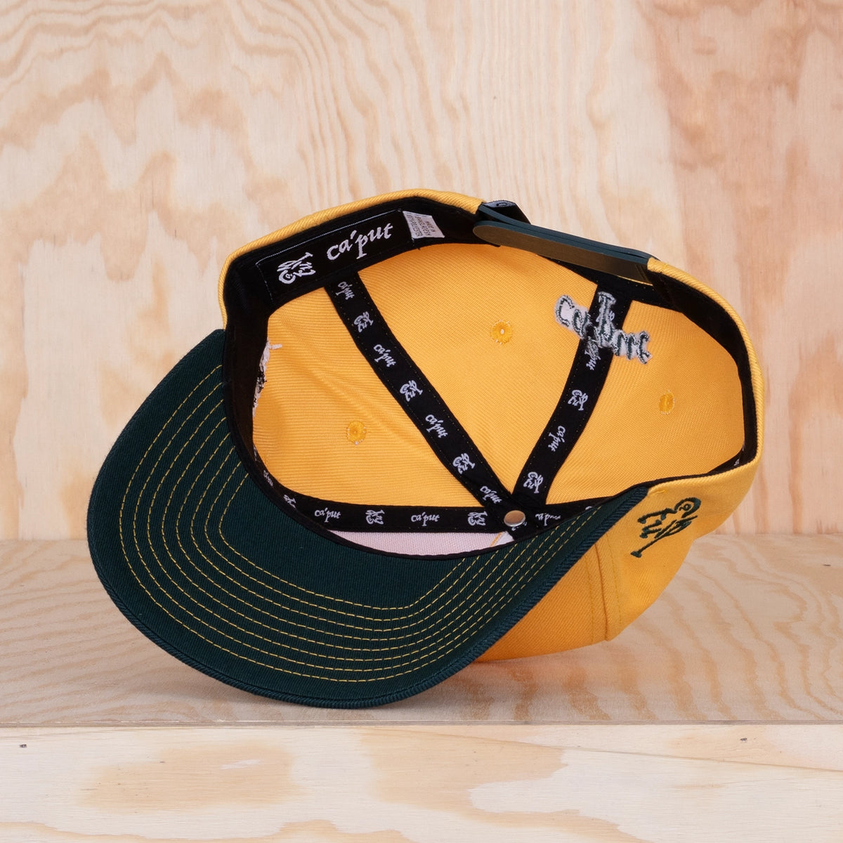 Ca'put Letter Ö Cap Gold / Dark Forest