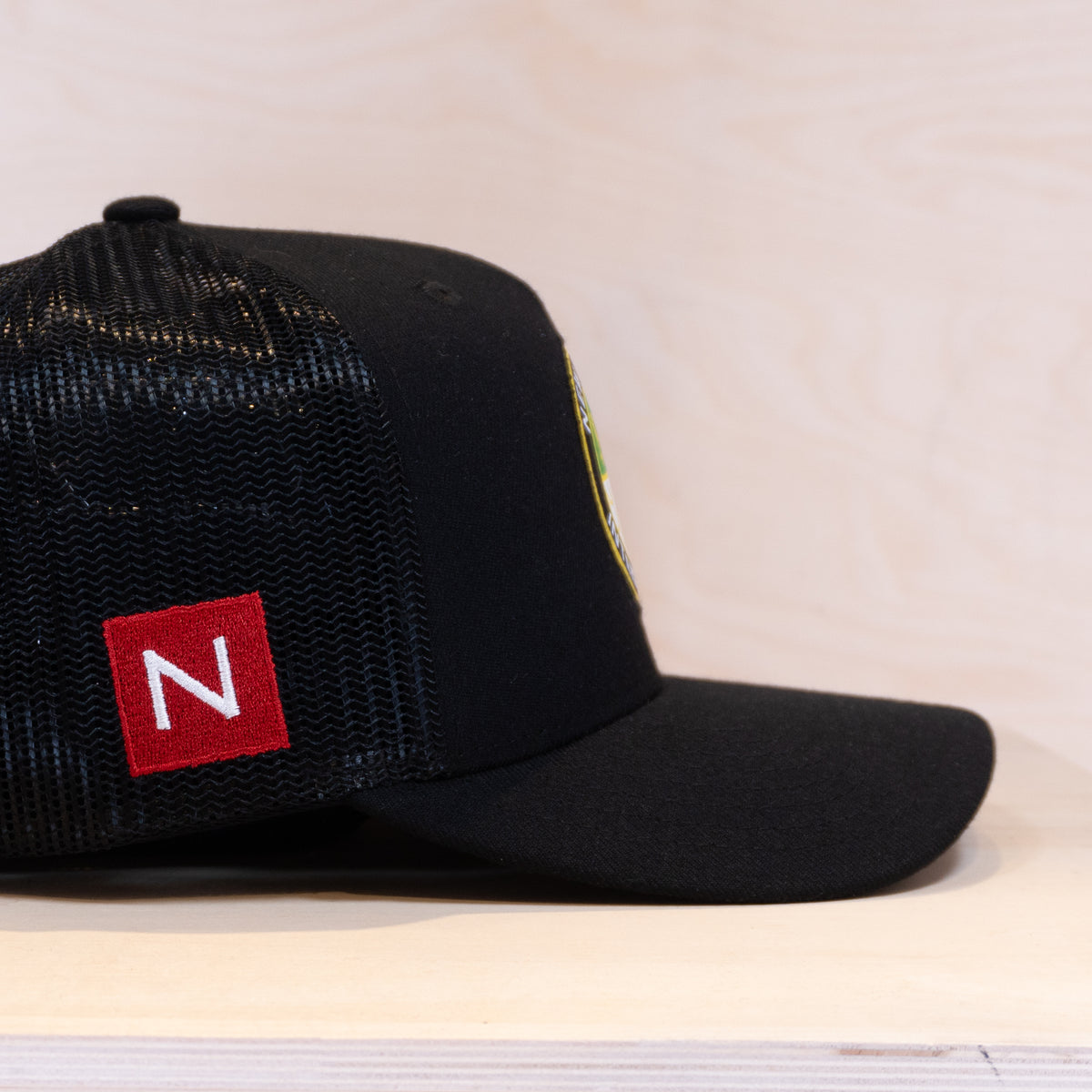 New Black Emblem Trucker Cap Black