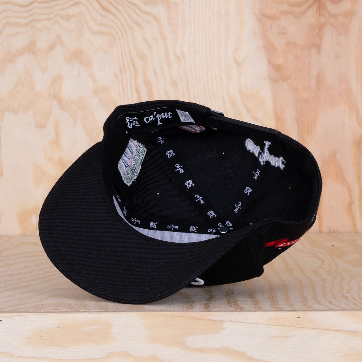 Ca'put All in Script Cap Black
