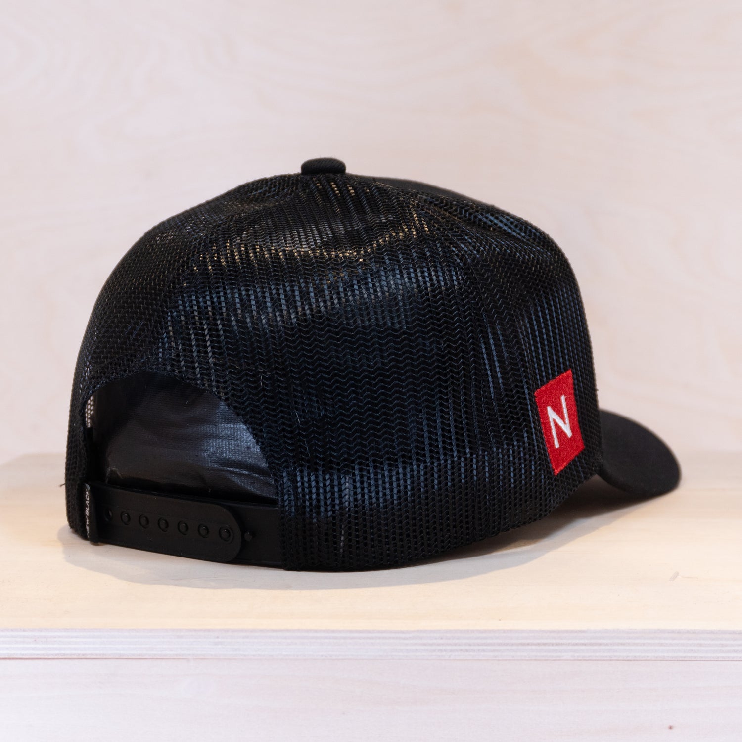 New Black Emblem Trucker Cap Black
