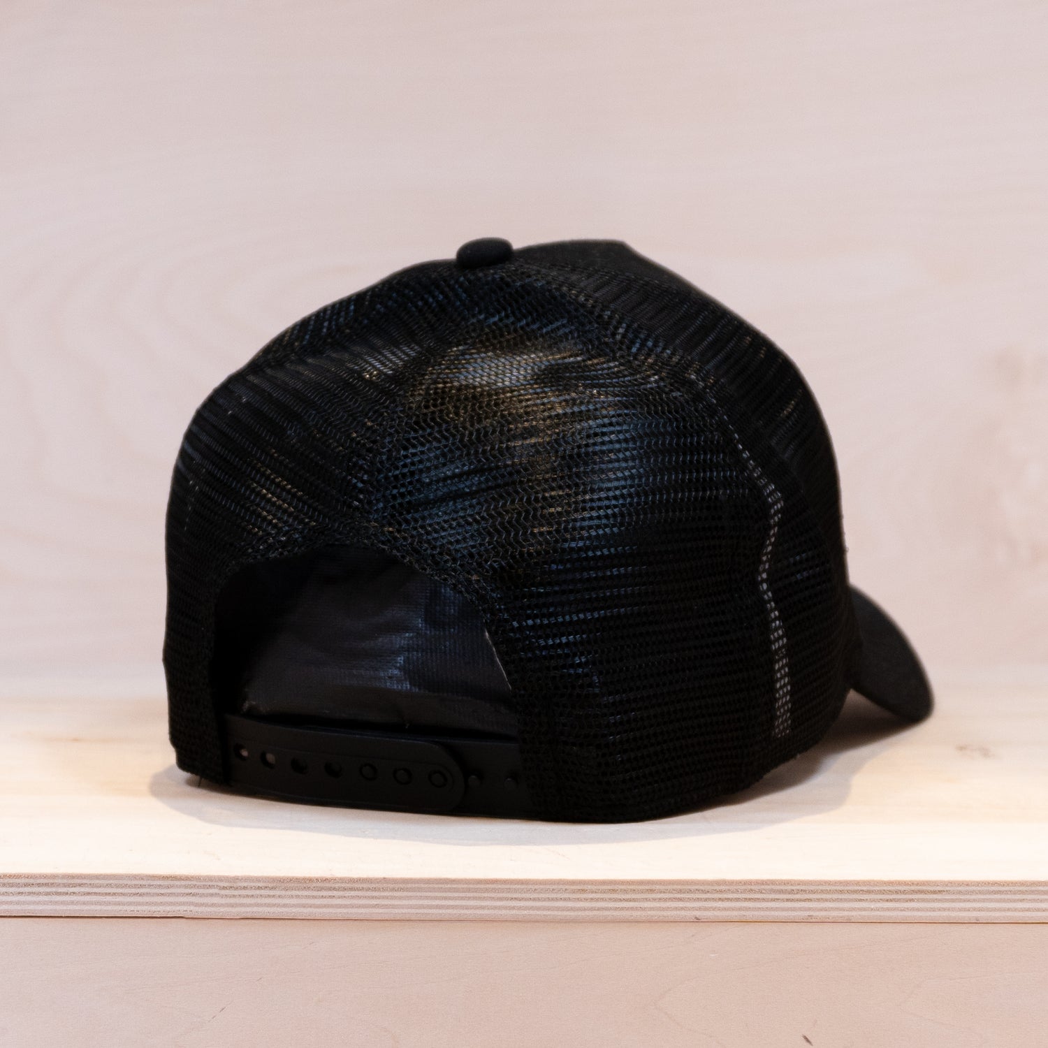 New Era Oval State Patch Trucker Cap Black